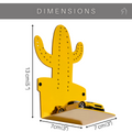 Yellow metal cactus-shaped hook with perforated details, featuring dimensions of 13 cm (5 inches) in height and 7 cm (3 inches) in width and depth, mounted on a white background with a small toy car on the shelf