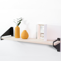 Wooden shelf with geometric metal brackets