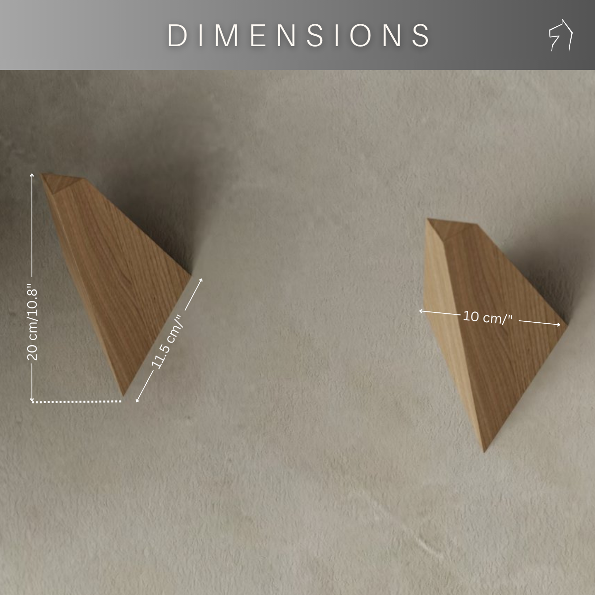 Triangular wooden wall hooks displayed with dimensions: 20 cm (7.87”) height, 11.5 cm (4.5”) depth, and 10 cm (4”) width, set against a neutral wall under the title &