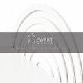 Close-up of a white, semi-circular metal shelf with a concentric, arched pattern.