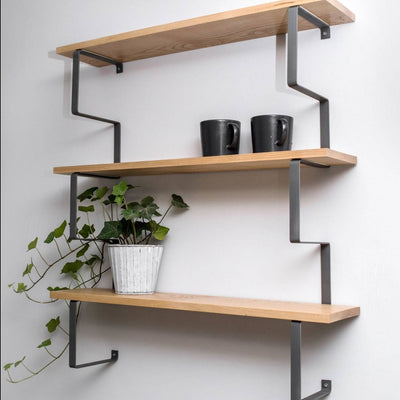 Floating wooden wall shelf with black metal industrial construction bracket oak finish