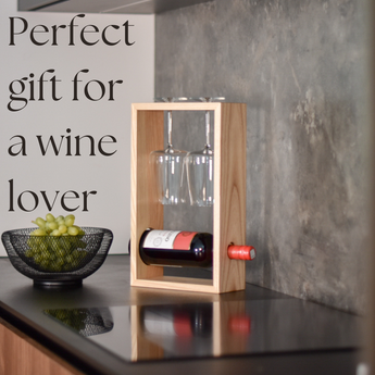 wine holders for wine bottles from ashwood on countertop with wine bottle and two glasses