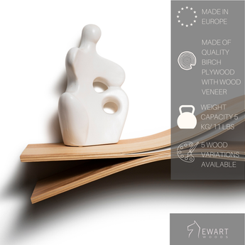 Wooden floating shelf fish form tail end design close-up