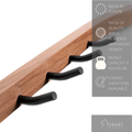 Wooden bathroom towel rack hooks close-up with manufacturer details