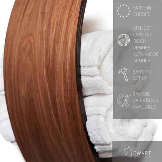 Close-up of wooden bathroom towel holder with manufacturer specifics 