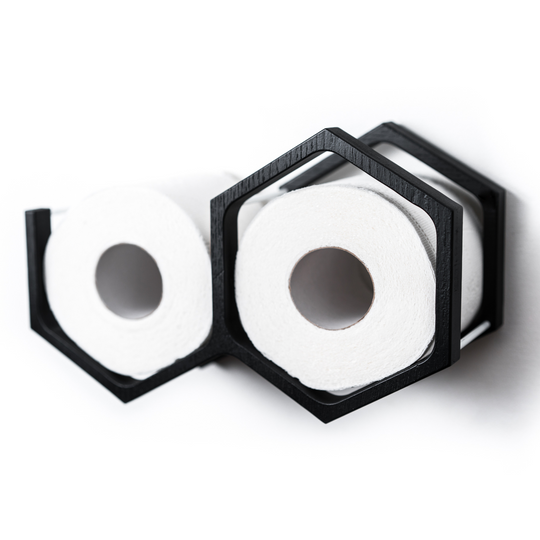 Mini honeycomb toilet paper roll holder in black color