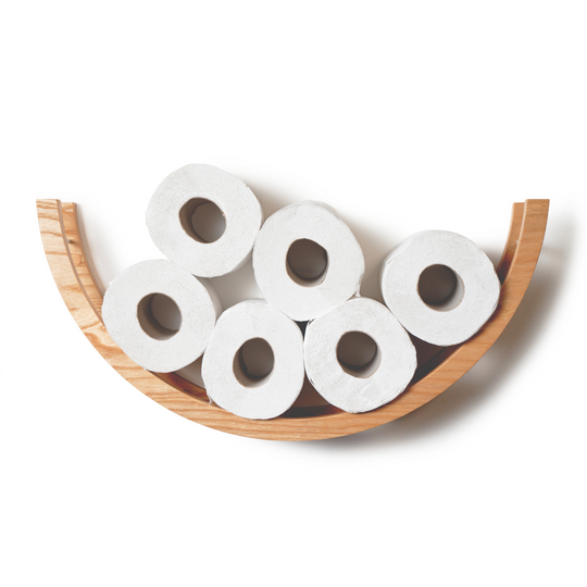 Top view of a wooden half-circle toilet paper holder, displaying six rolls of toilet paper. The holder is made of light wood with a smooth texture