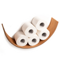 Front view of a curved wooden toilet paper holder displaying five rolls of toilet paper. The holder is made of light wood, offering a sleek and minimalist design.