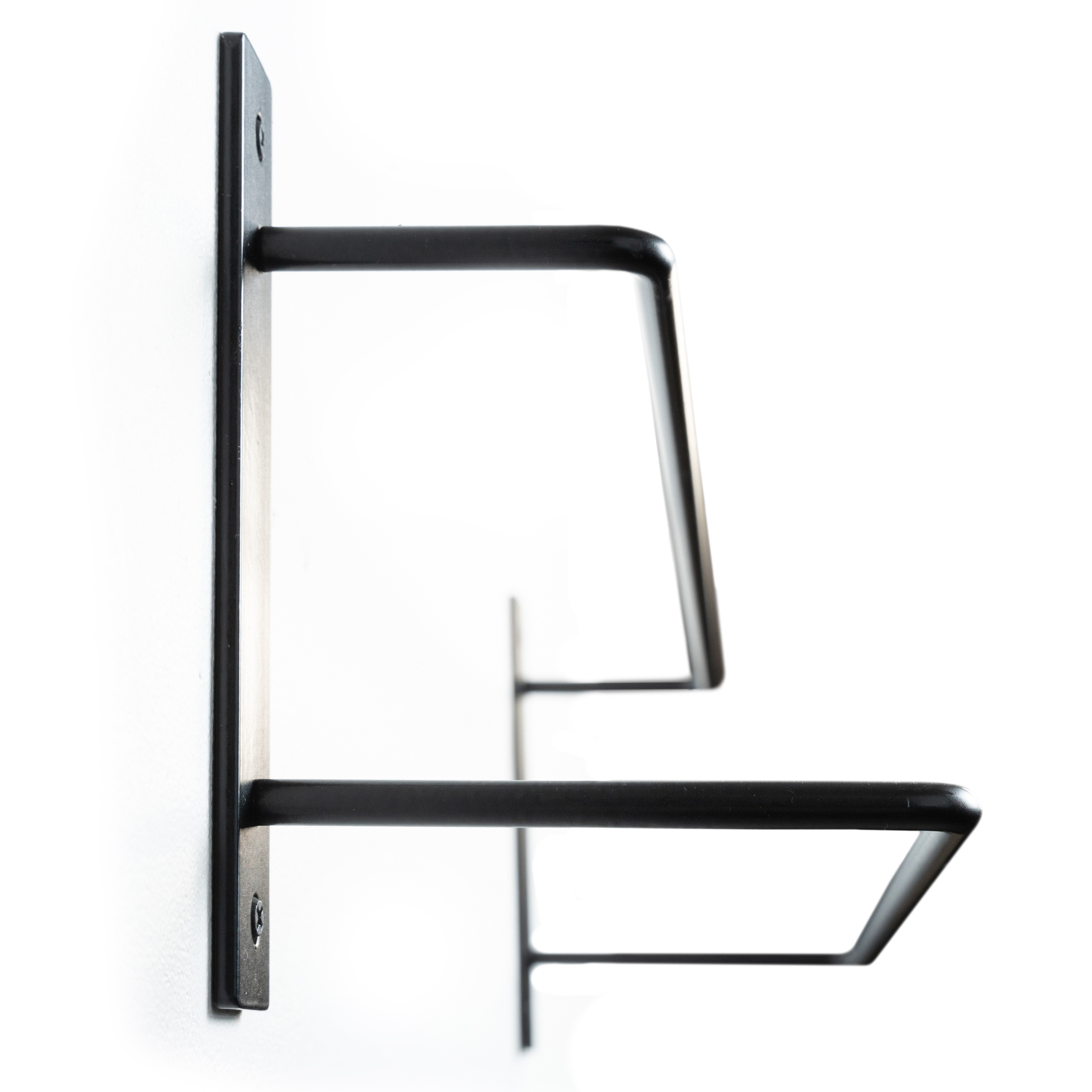 Side view of a black metal wall-mounted double hook rack with a sleek, geometric design.
