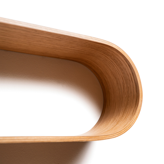 Wooden shelf oval curved edge close-up