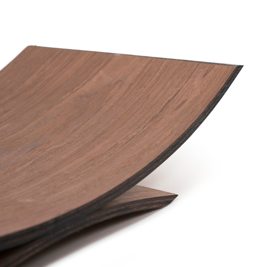 Close-up of the curved wooden holder, highlighting its texture and smooth finish, isolated on a white background.