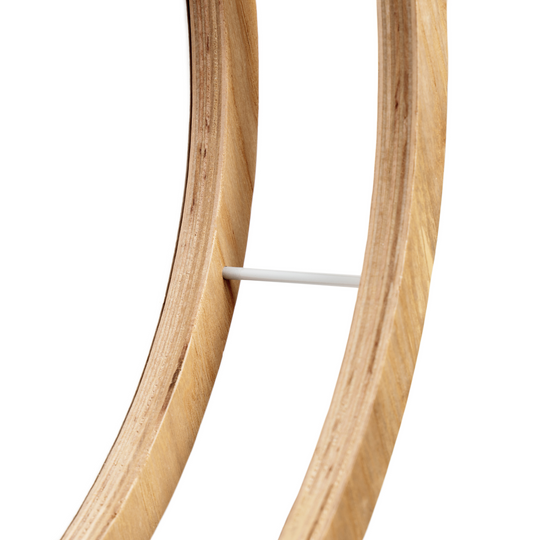 Close-up of wooden circle toilet paper holder 