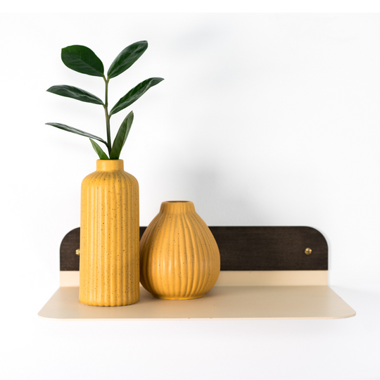 Compact metal shelf with round corners and golden screws