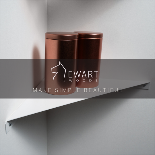 White corner shelf with two copper-colored containers and Ewart Woods logo overlay with the slogan &