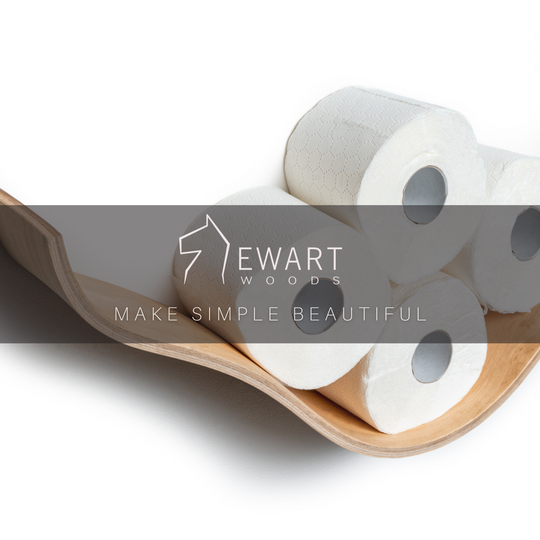 Ash wooden shelf with a cloud-like, curved design holding rolls of toilet paper. The image features the &