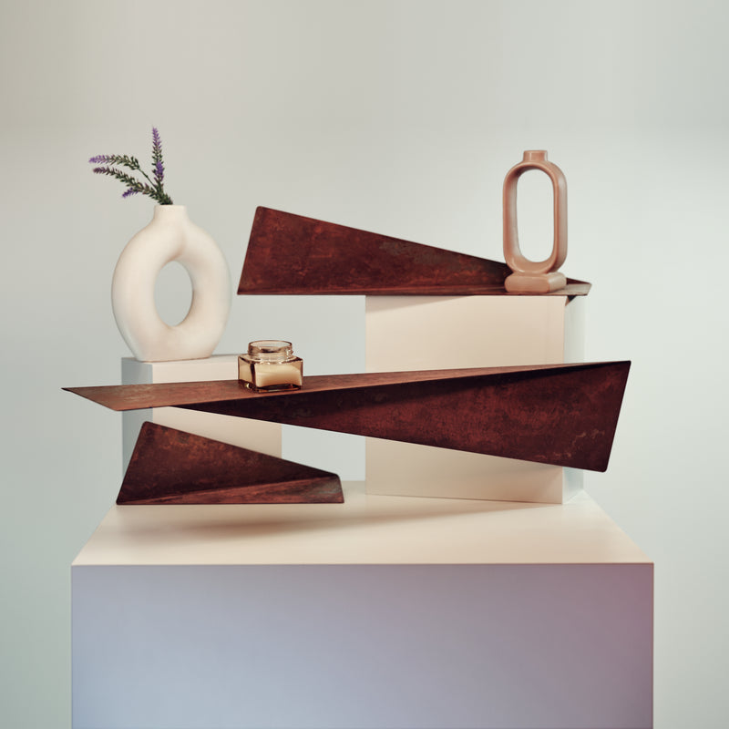 Wall mounted floating set of 3 rusted metal shelves in different dimensions