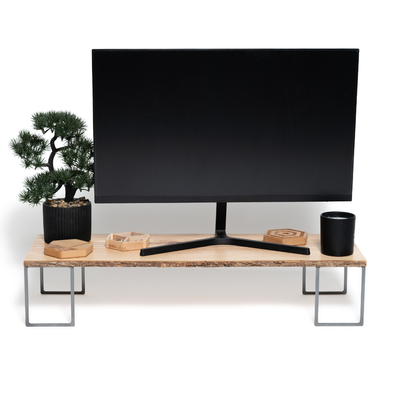 Front view of wooden monitor stand with tree bark and metal legs, perfect for desk organization