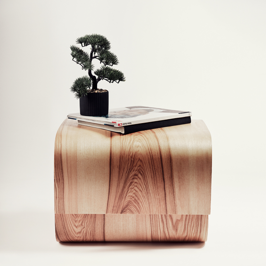 Side view of small round living room coffee table from wood with modern design