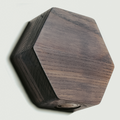 Hexagonal Grey wooden key holder showcasing a natural wood grain finish