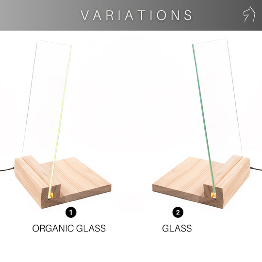 Two variations of a display stand with wooden bases: one with an organic glass panel on the left and the other with a regular glass panel on the right. Both panels are inserted into the wooden base.