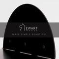 Black wall-mounted half-circle shelf with Ewart Woods logo and slogan &
