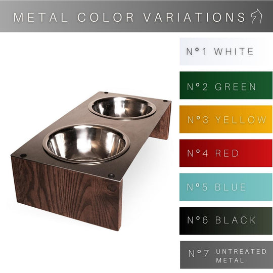 Raised dog feeder with a metal surface and wooden base, holding two stainless steel bowls. The metal top comes in seven different finishes: white, green, yellow, red, blue, black, and raw metal.