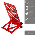A vibrant red metal phone holder with a geometric cutout design, shown with product details highlighting European-made, all-mobile compatibility, high-quality steel, and easy setup.