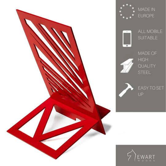 A vibrant red metal phone holder with a geometric cutout design, shown with product details highlighting European-made, all-mobile compatibility, high-quality steel, and easy setup.