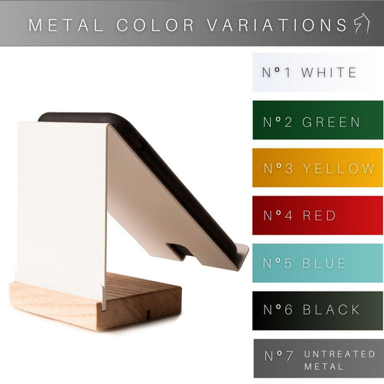 Phone stand featuring a metal frame in white and a wooden base, displayed with a smartphone. The image showcases metal color options such as white, green, yellow, red, blue, black, and raw metal.