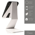 White Z-shaped phone stand holding a smartphone, with product details on the right mentioning European-made, all-mobile compatibility, high-quality steel, and 1kg capacity.