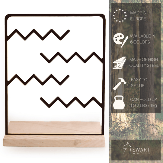 Minimalist black jewelry stand with zigzag pattern, wooden platform, highlighting steel construction and capacity details on the side.